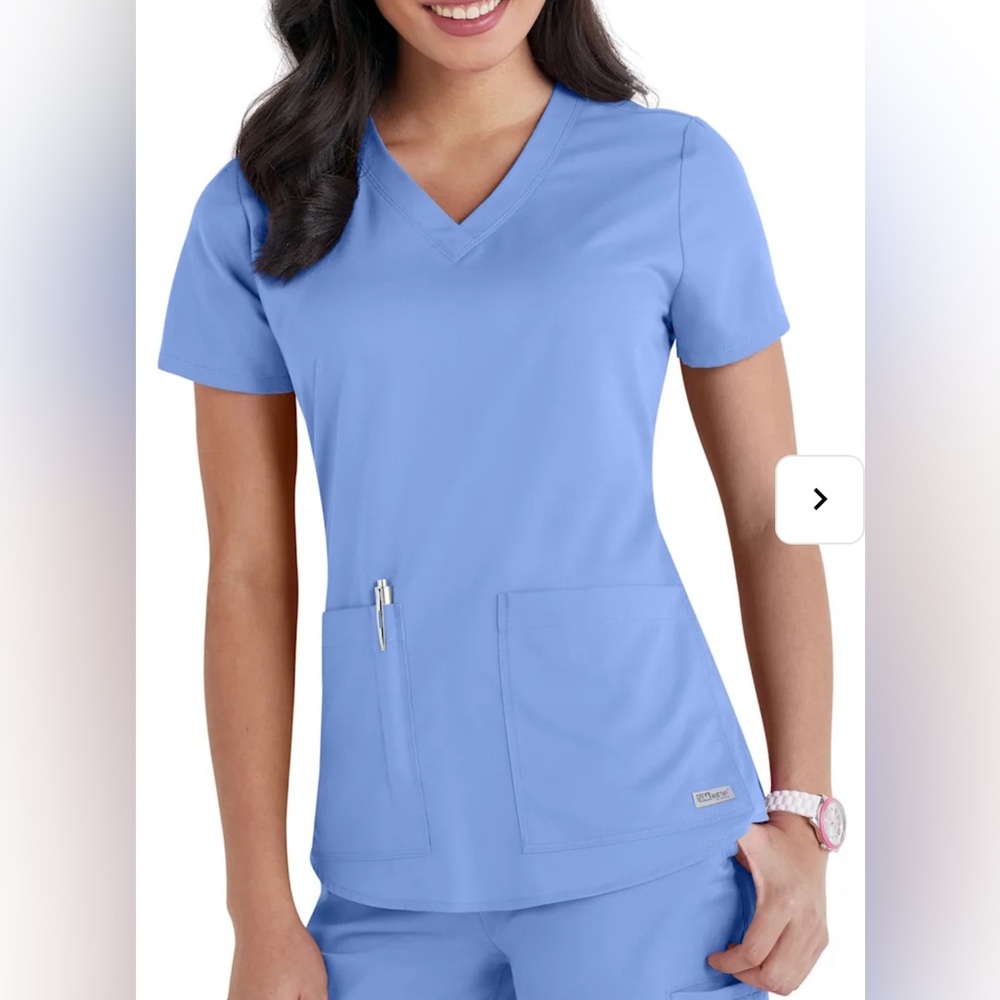 Grey’s Anatomy V-neck 2-pocket scrub top. Size small. Galaxy.